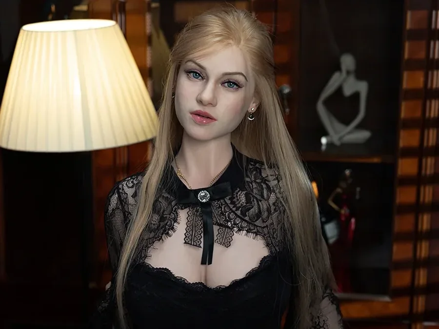 Full-size doll with long blonde hair in a black lace dress